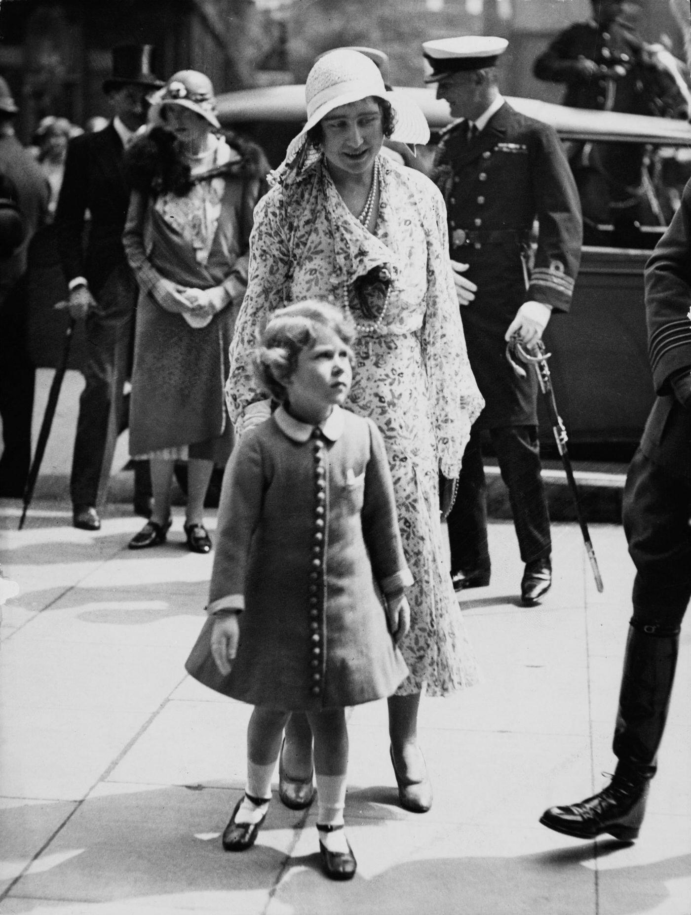 #27 Princess Elizabeth and her mother Queen Elizabeth arrive at Olympia to attend the Royal Tournament in London in June 1931.