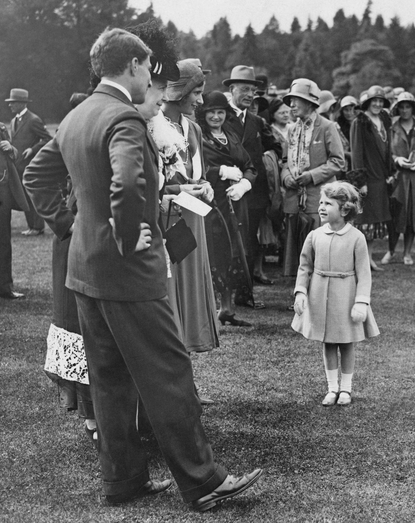 #31 Princess Elizabeth at a garden party held at Glamis Castle in Angus, Scotland, 12th August 1931.