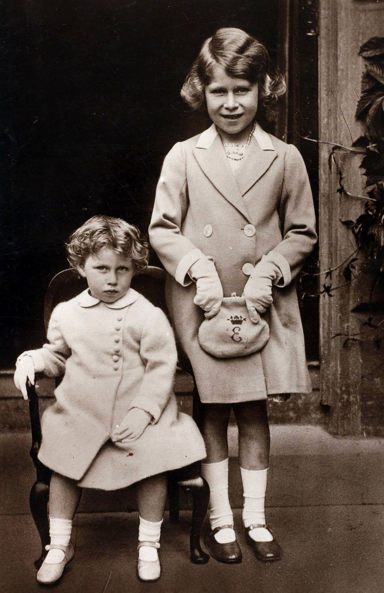 #33 Princess Elizabeth daughter of The Duke and Duchess of York pictured with her younger sister Princess Margaret Rose.