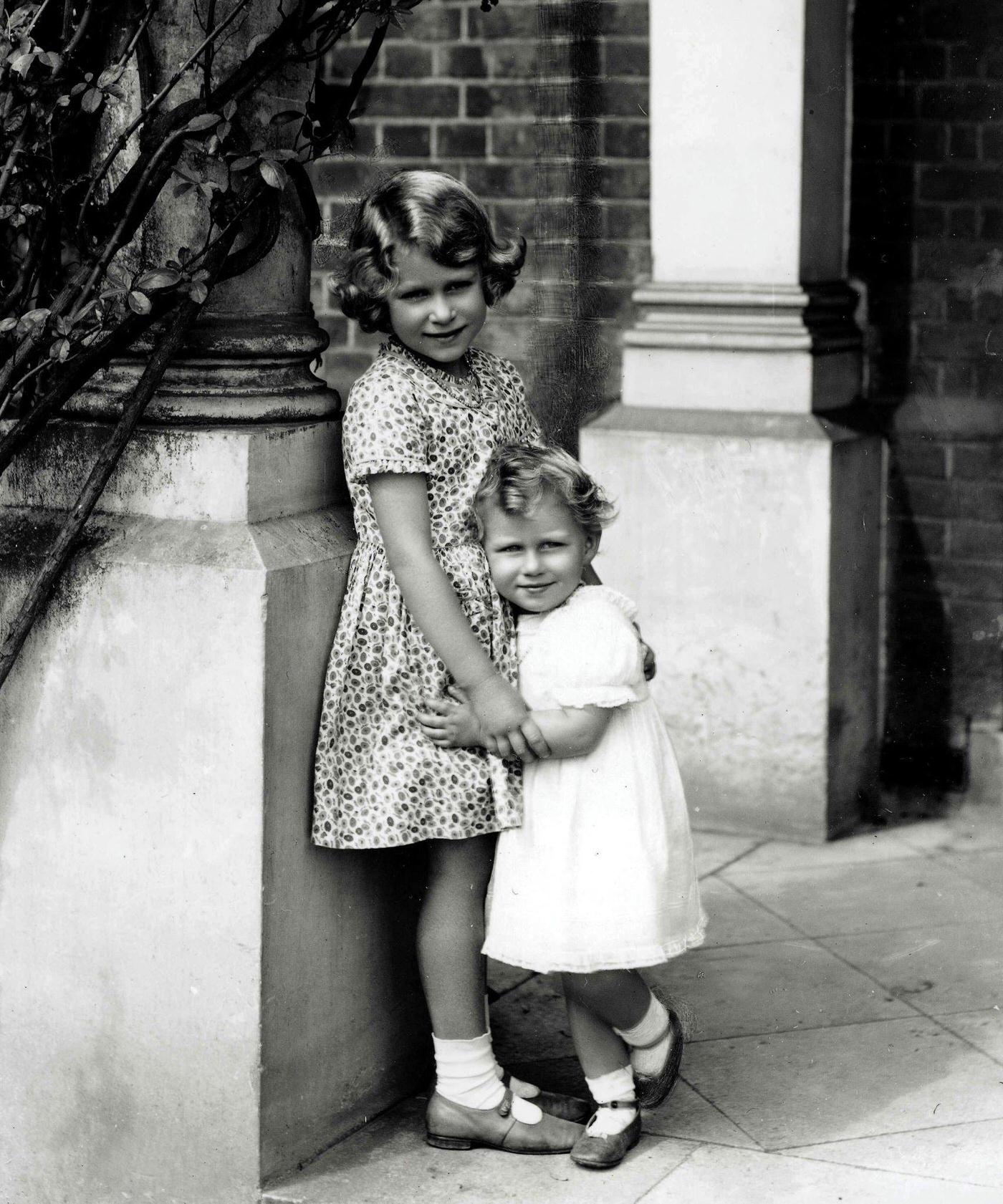 #38 A young Princess Elizabeth, later Queen Elizabeth II, and her sister Princess Margaret, 1932