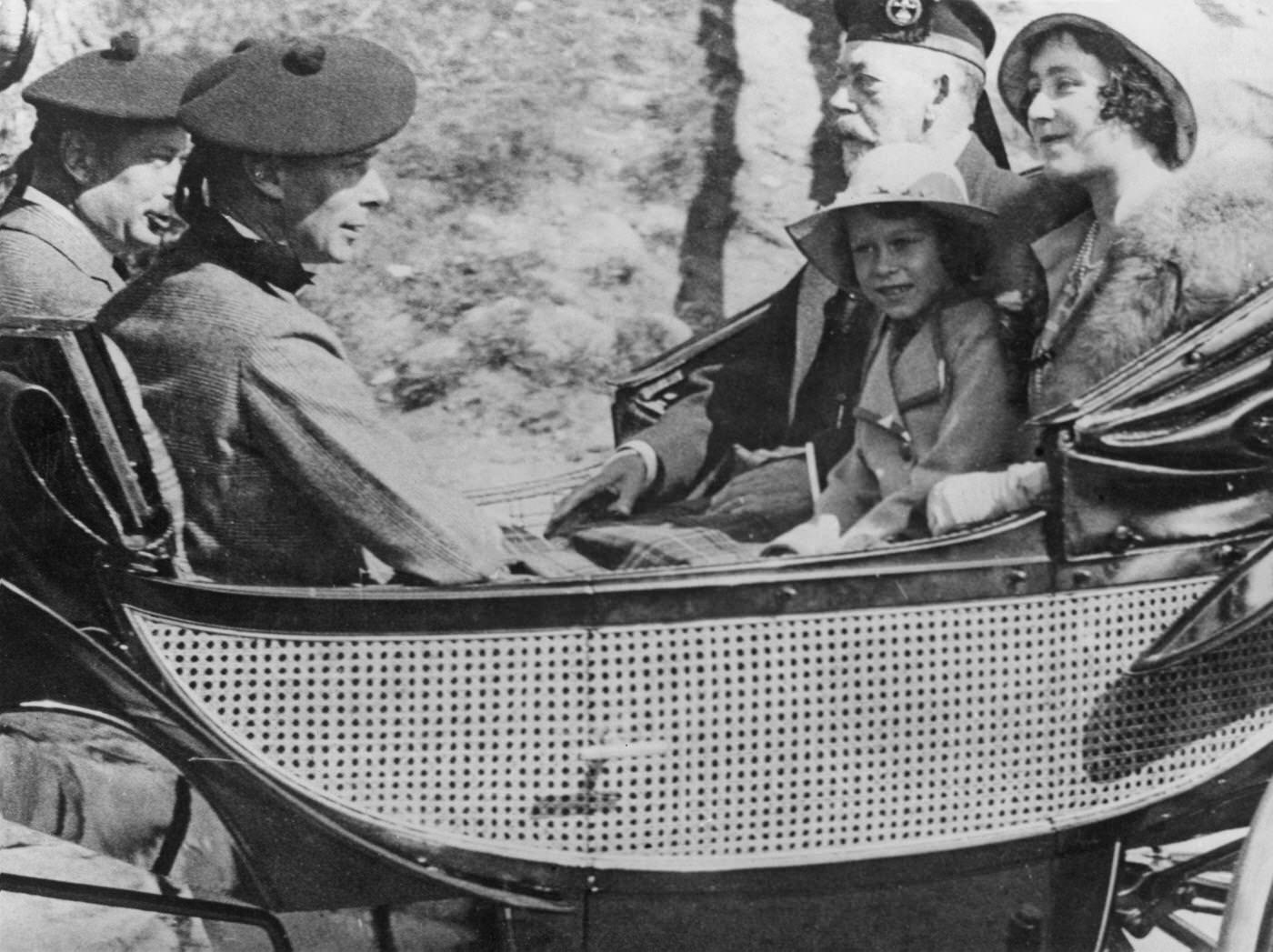 #46 Queen Elizabeth II in a carriage with King George V and her parents, the Duke and Duchess of York (later King George VI and Queen Elizabeth), 1933.