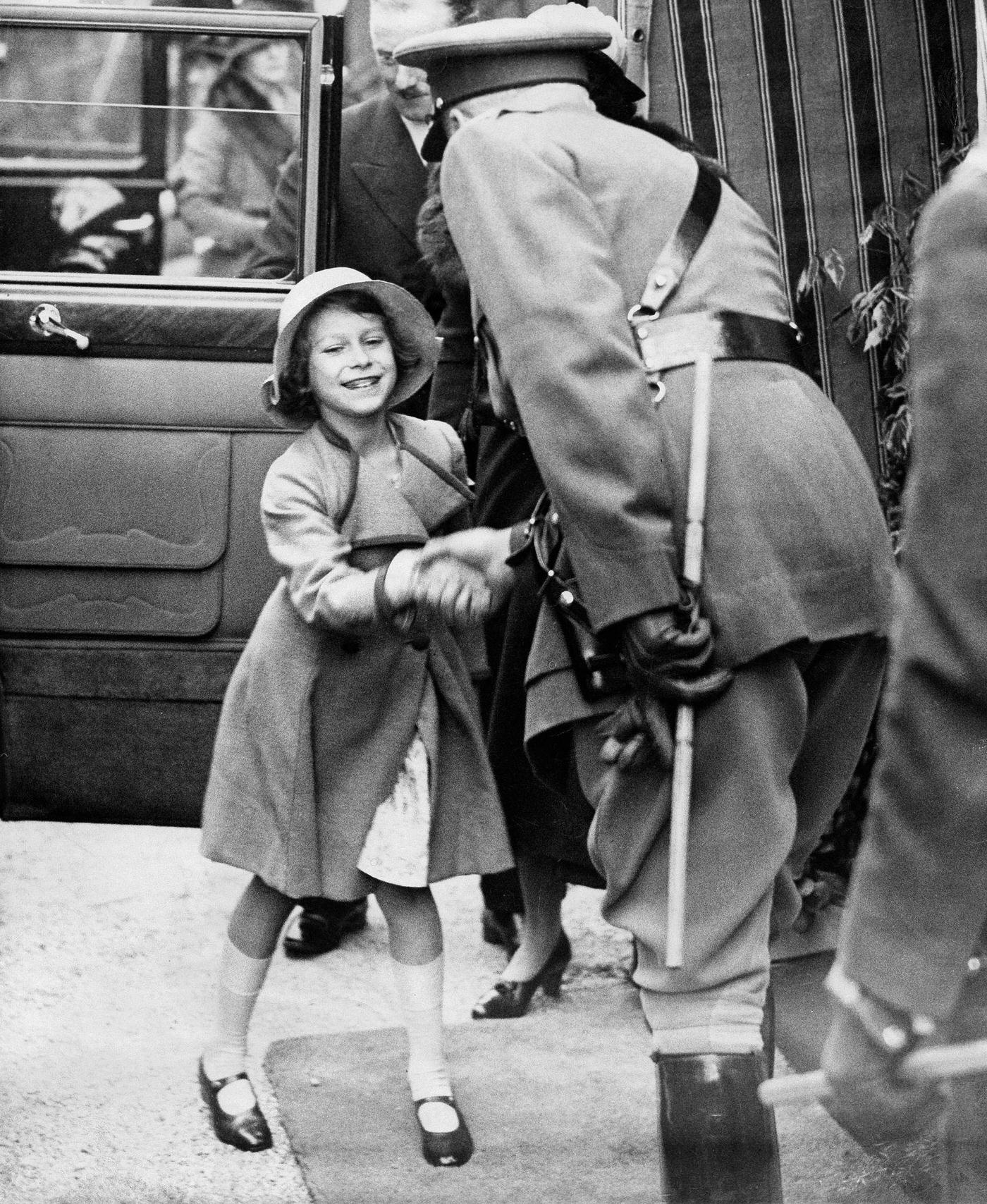 #71 Queen Elizabeth II Greets an Officer as a Child, 1935