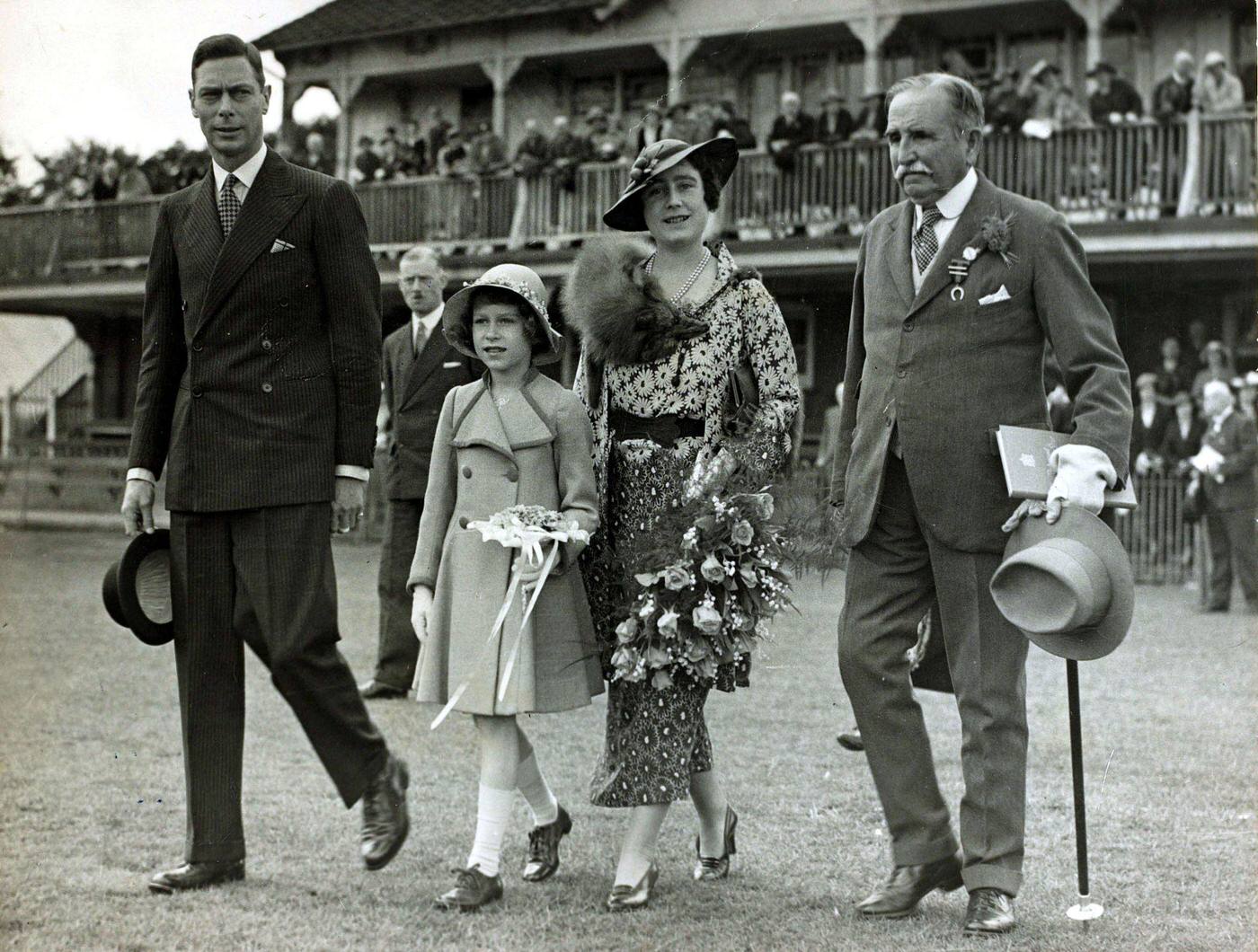 #75 Duke and Duchess of York with Princess Elizabeth at Children’s Day, 14th June 1935