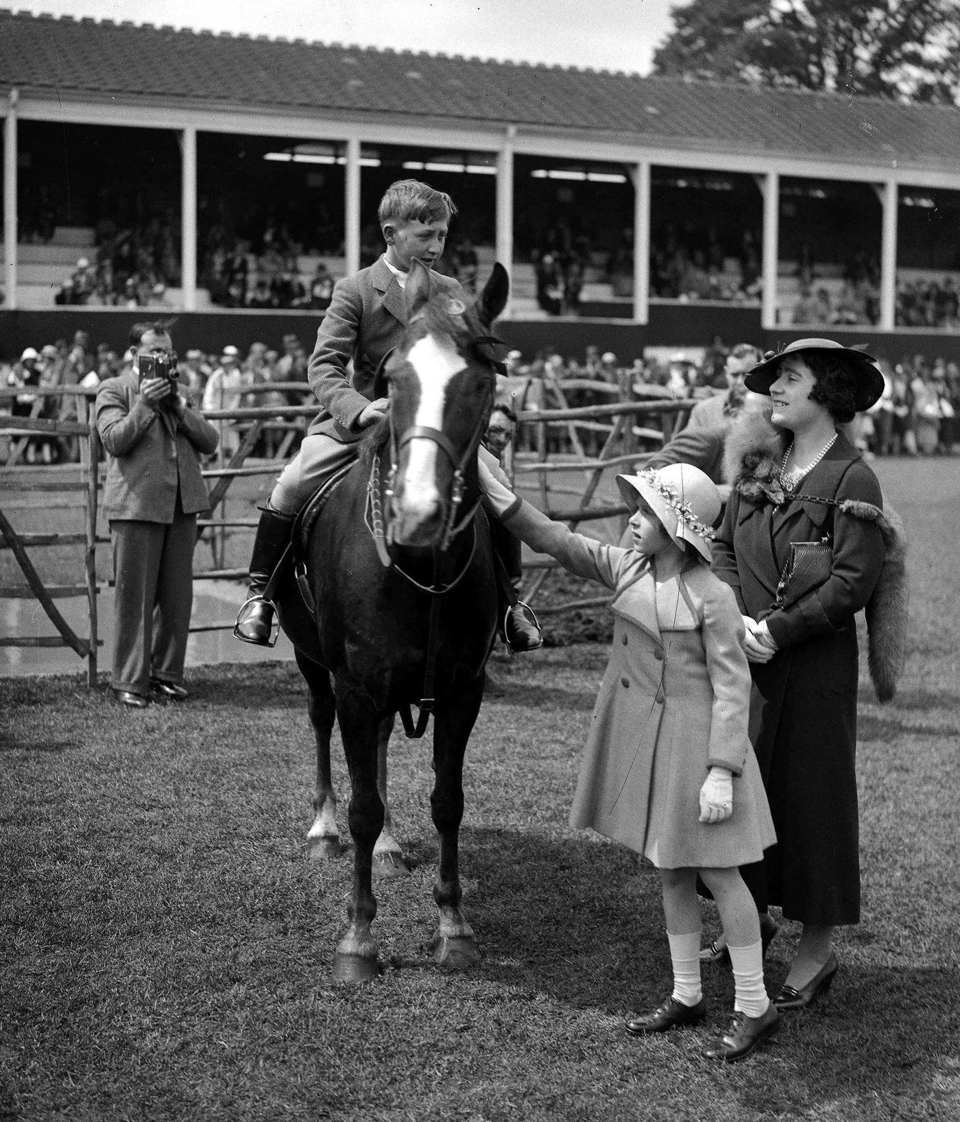 #76 The Queen Mother, with daughter Princess Elizabeth, 1935