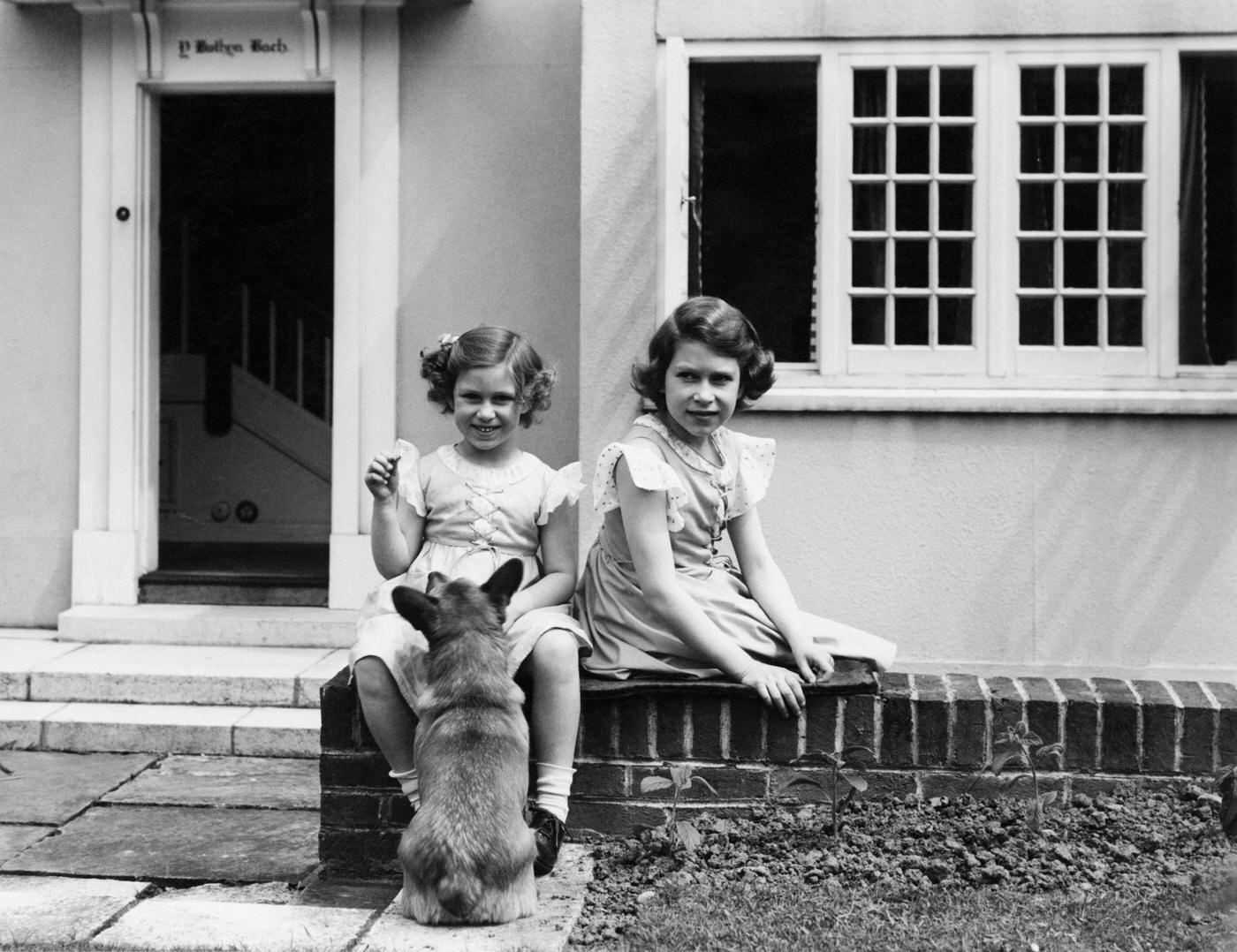 #99 Princess Elizabeth and Princess Margaret at the Royal Lodge, 1939.