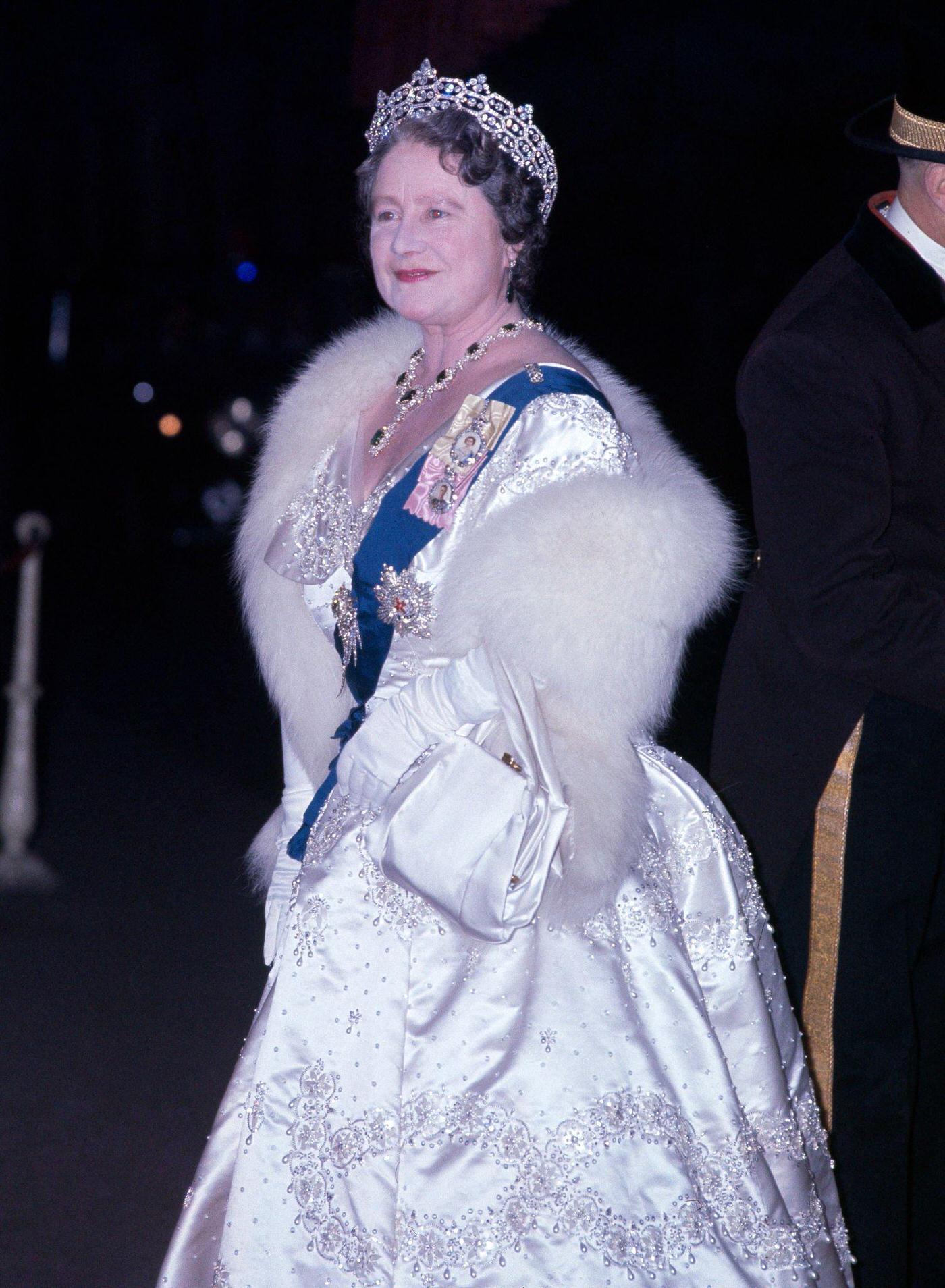 #120 The Queen Mother, arriving for a gala performance at Covent Garden, London, 1963.
