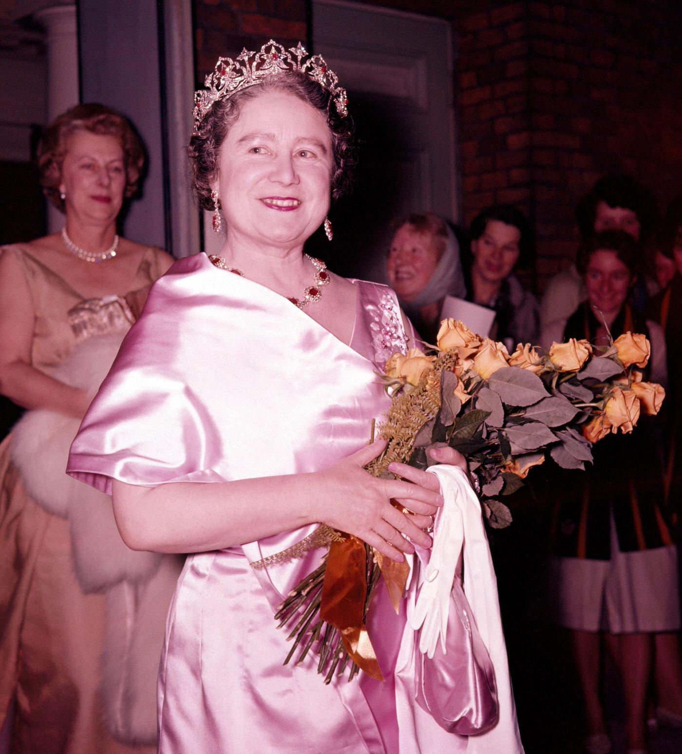 #121 Queen Elizabeth, The Queen Mother, attending a theatrical performance in London, 1960.