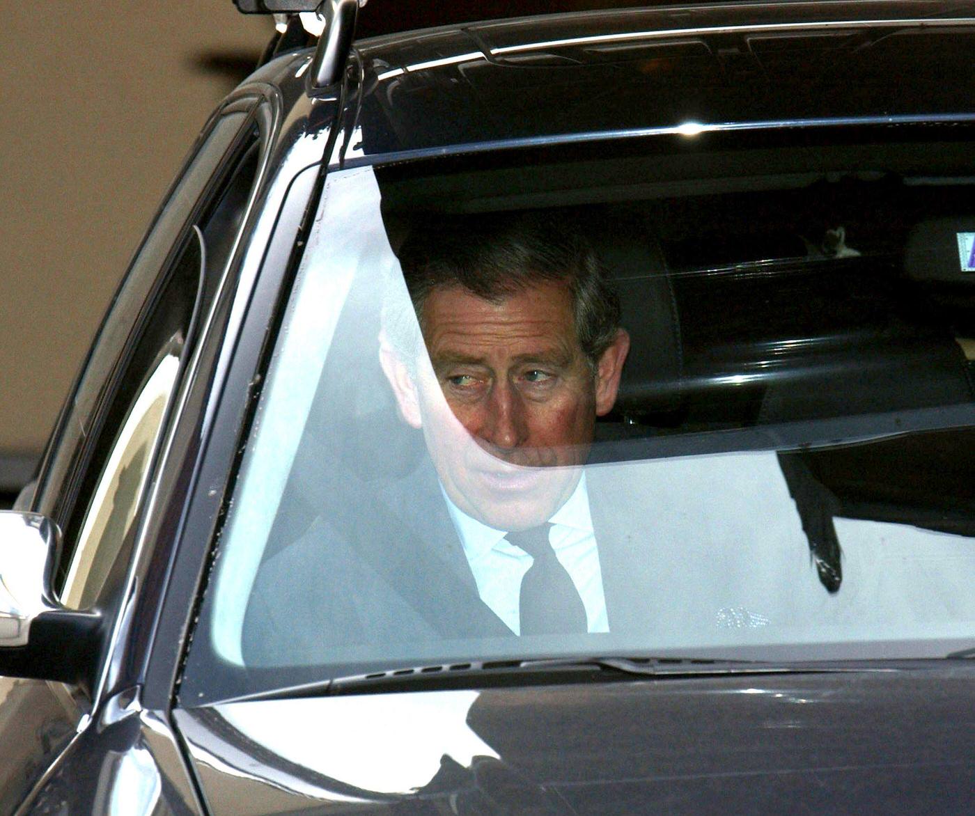 #132 Prince Charles on his way to Windsor following the death of the Queen Mother, Klosters, 2002
