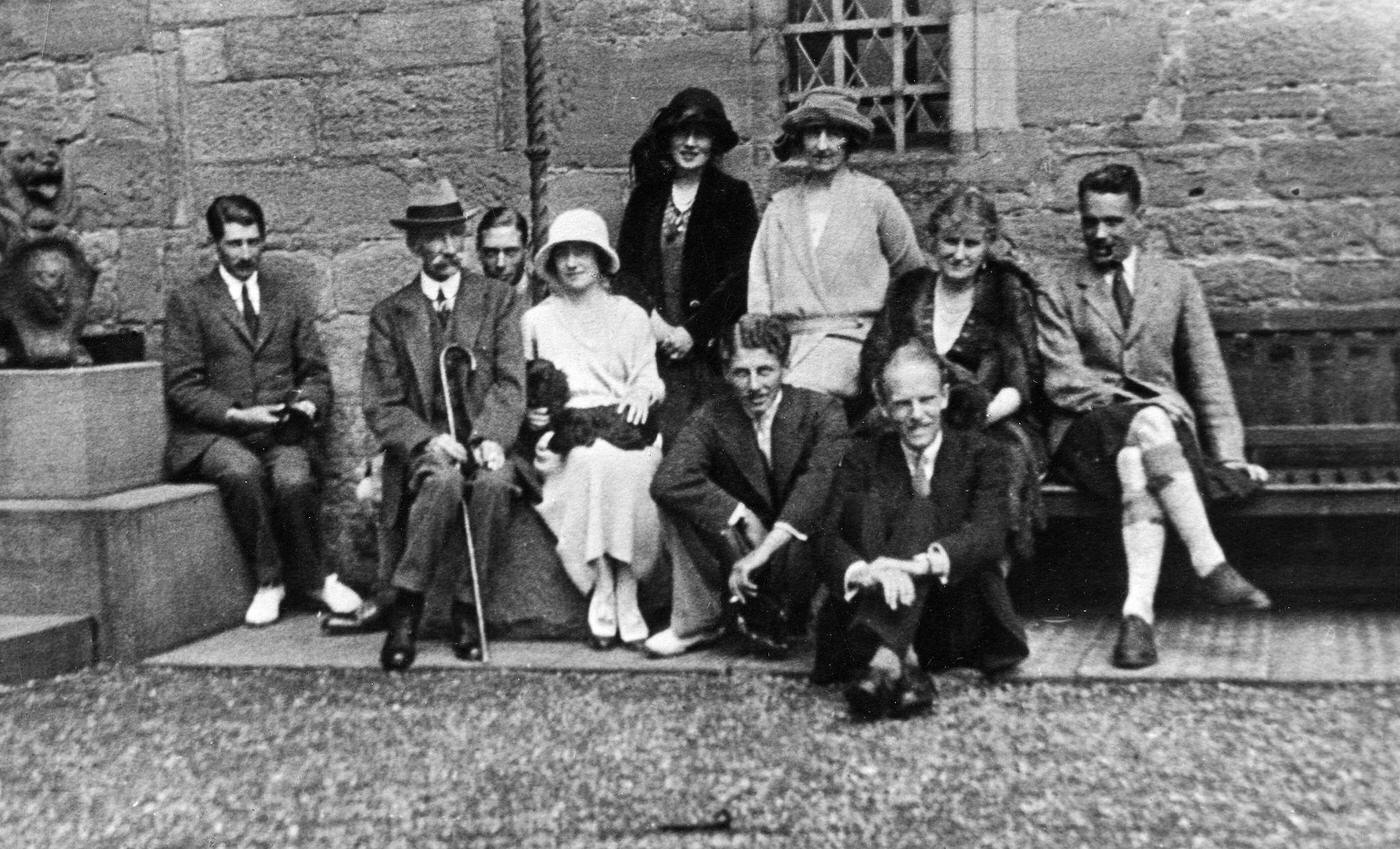 #15 Lady Elizabeth Bowes-Lyon, 4th left, and the Duke of York, 3rd left, at a family gathering.