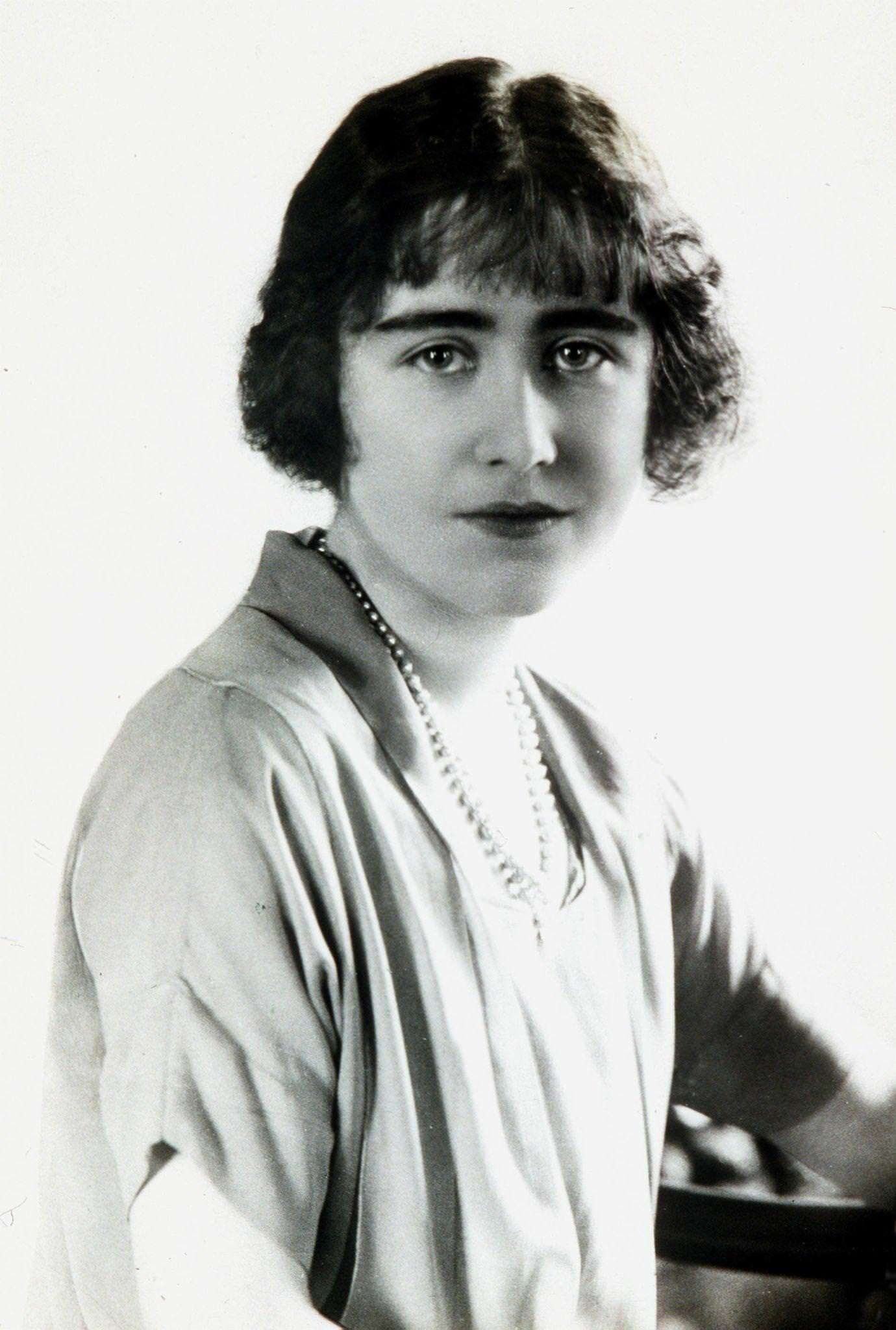 #33 Queen Elizabeth, the Queen Mother when she was Lady Elizabeth Bowes Lyon, taken at Glamis Castle in 1923