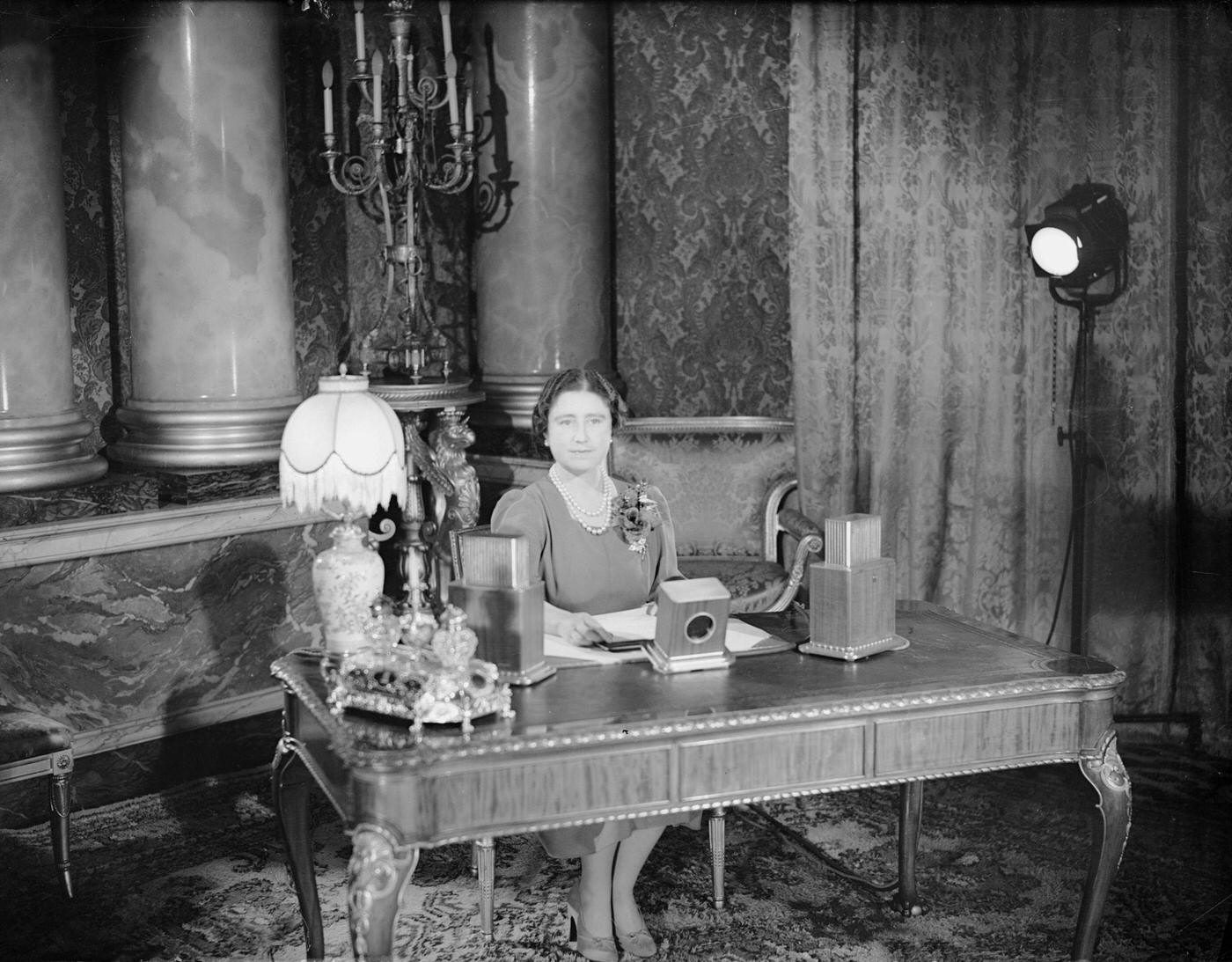 #86 Queen Elizabeth making a radio broadcast to women of the British Empire,1940.