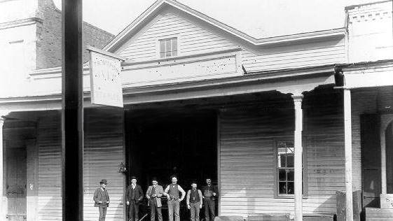 #83 Group in Front of T.R. Stephens Stable, 1895