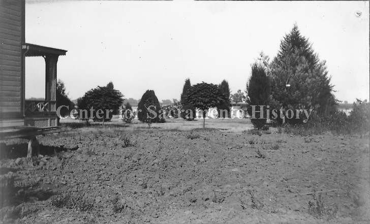 #57 View of plowed ground on side of McFarland house, 1895