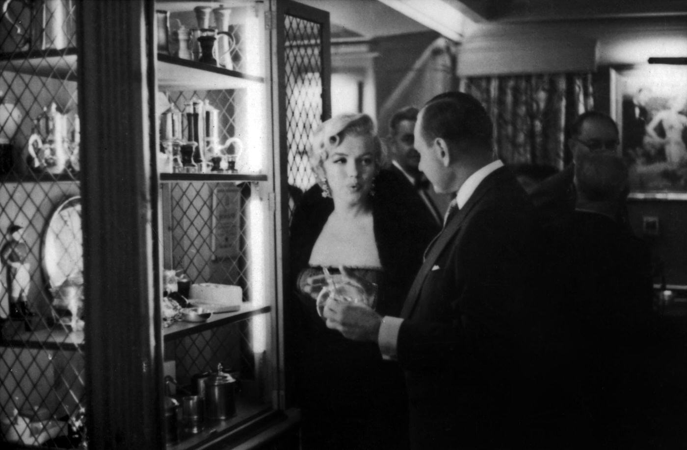 Marilyn Monroe with Bob Kriendler, co-owner of the ’21’ Club, at a press party for “The Seven Year Itch” at the ’21’ Club in 1954 in New York