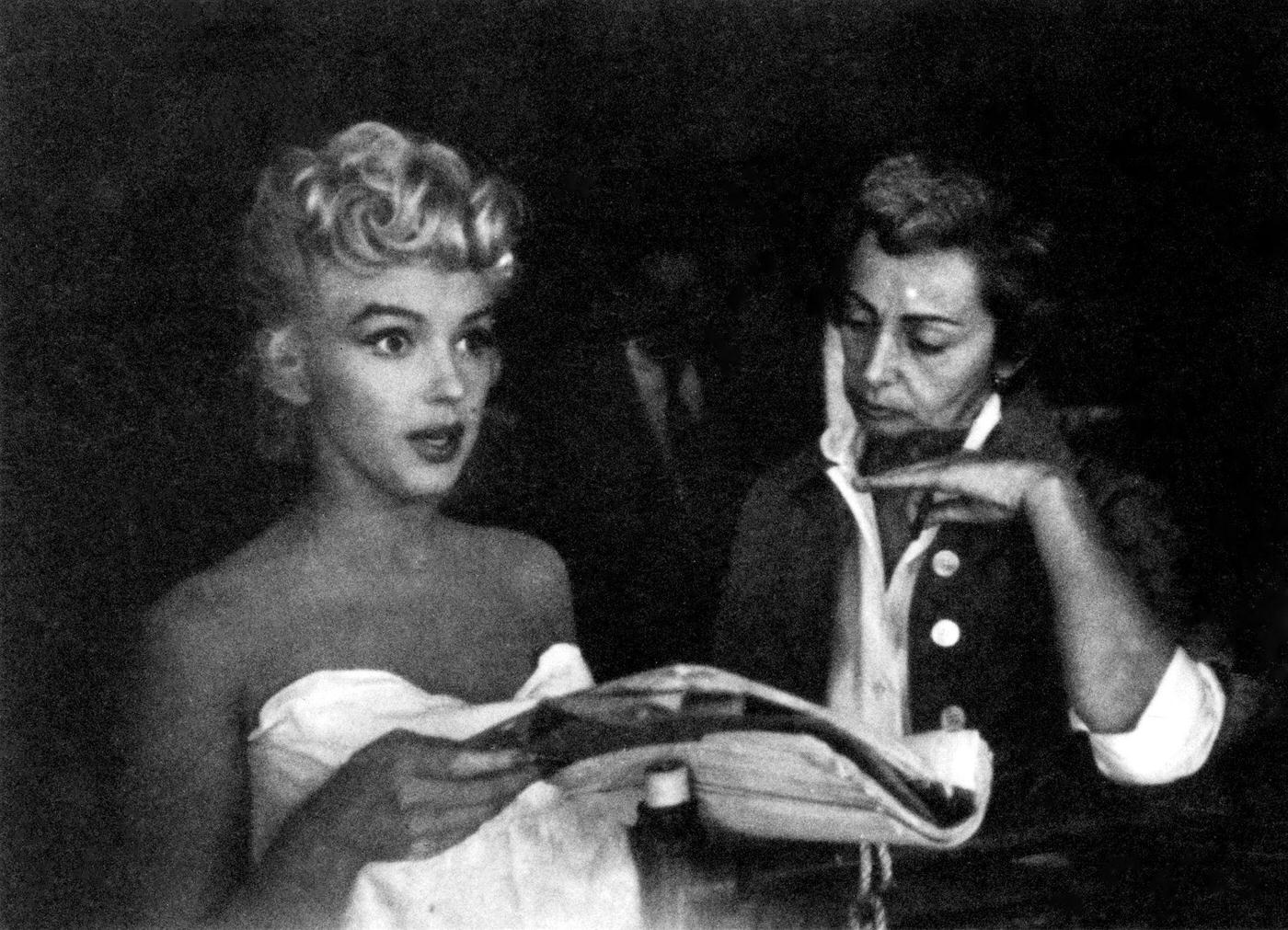 Marilyn Monroe prepares for a bathtub scene with Columbia Pictures drama coach Natasha Lytess in 1954 during the filming of “The Seven Year Itch”