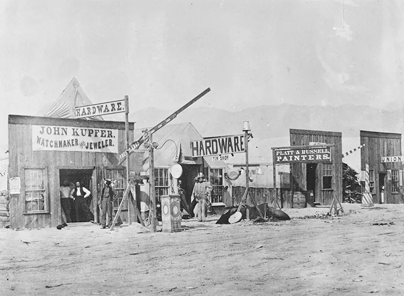 #104 A street view in a typical American Frontier town, Corinne, Utah in 1869.