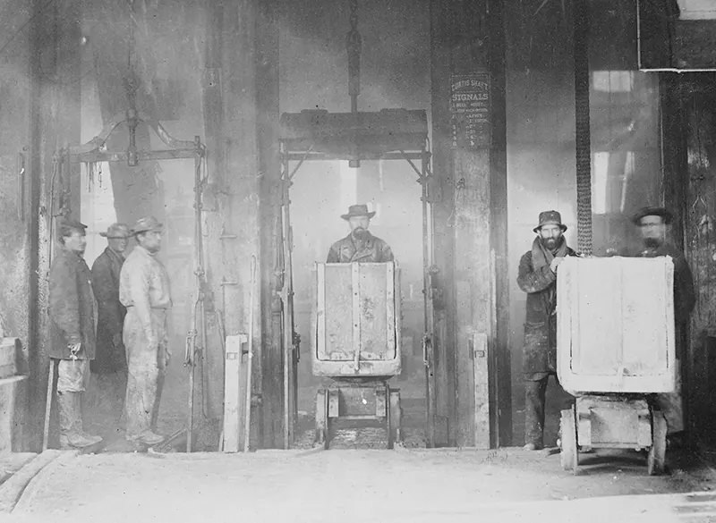 #111 Mine workers are pictured coming out of a mine shaft in Virginia City, Nevada, during the years 1867-1888.