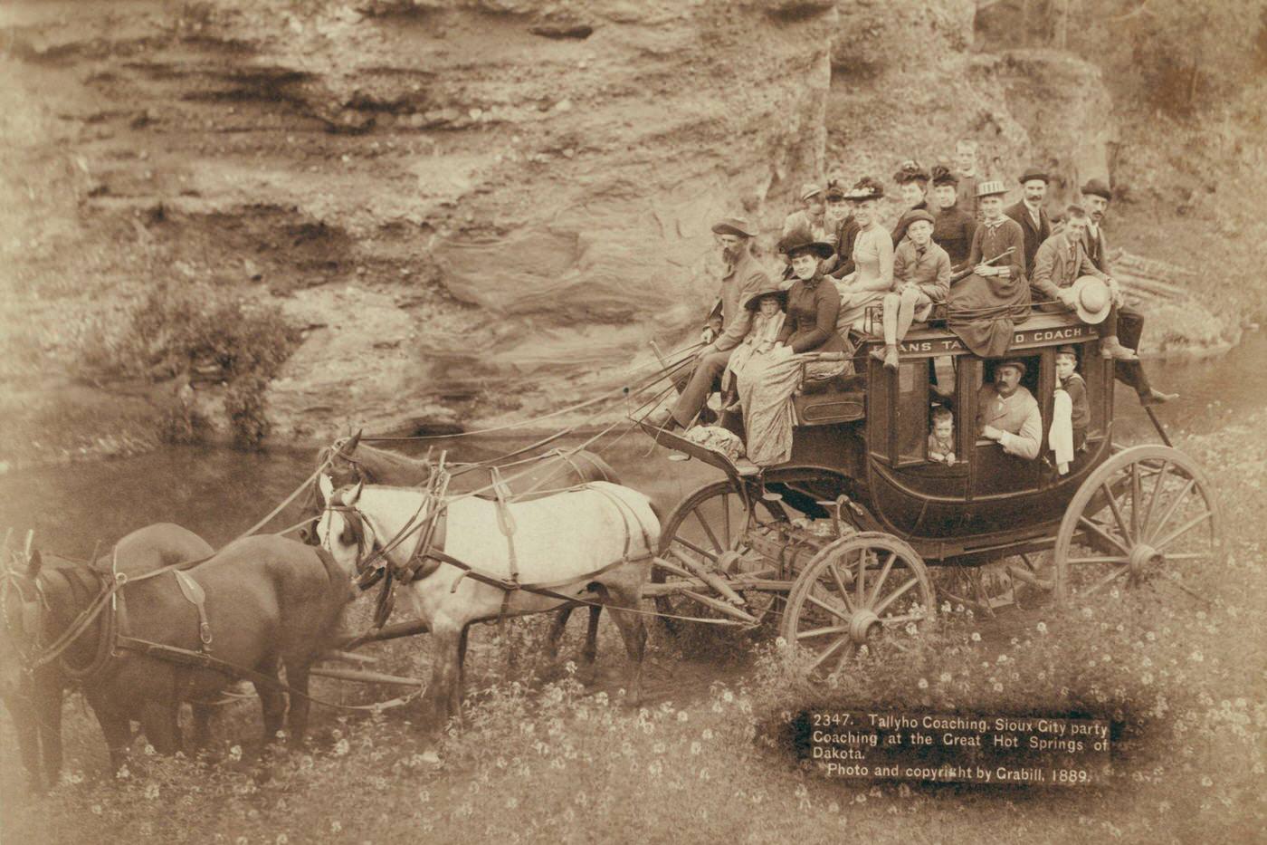 #45 Tallyho Coaching. Sioux City party Coaching at the Great Hot Springs of Dakota, United States, 1890: Horse-drawn stagecoach carrying formally dressed women, children, and men.