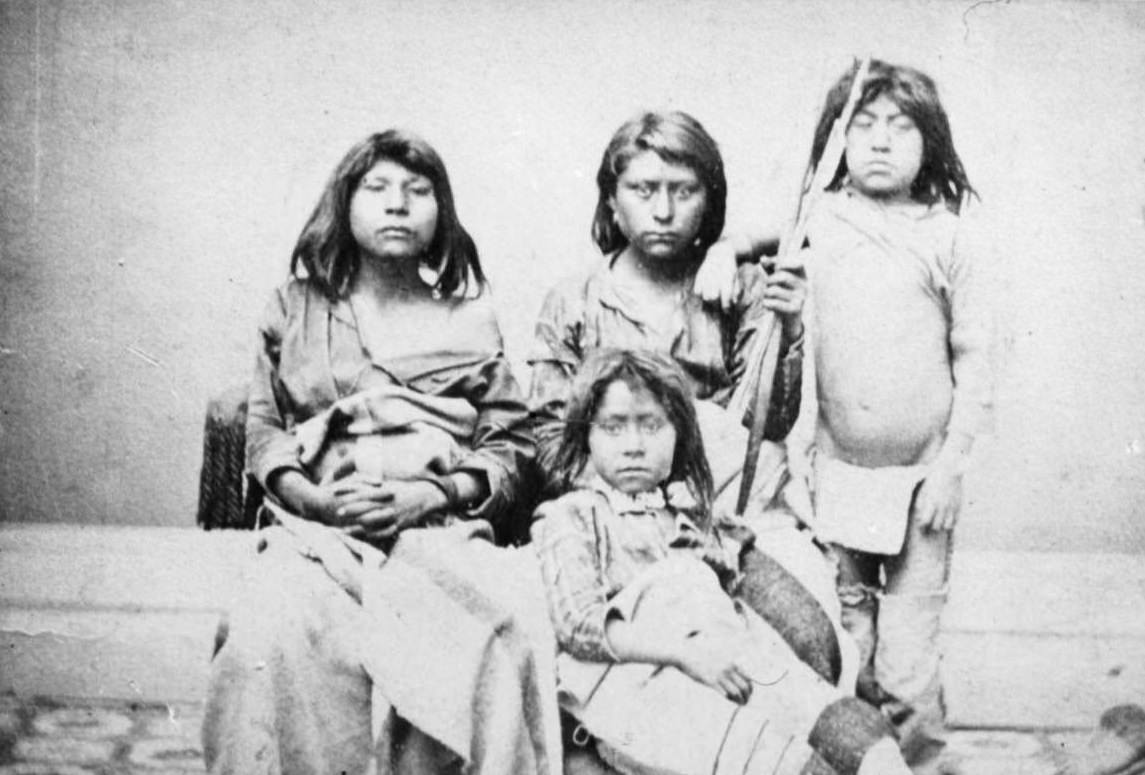 #68 Indian Cabinet Color By Haynes, photographer Charles Howard is the author of this photo of a Sioux family from 1875 at Fort Bridger, Wyoming Territory.