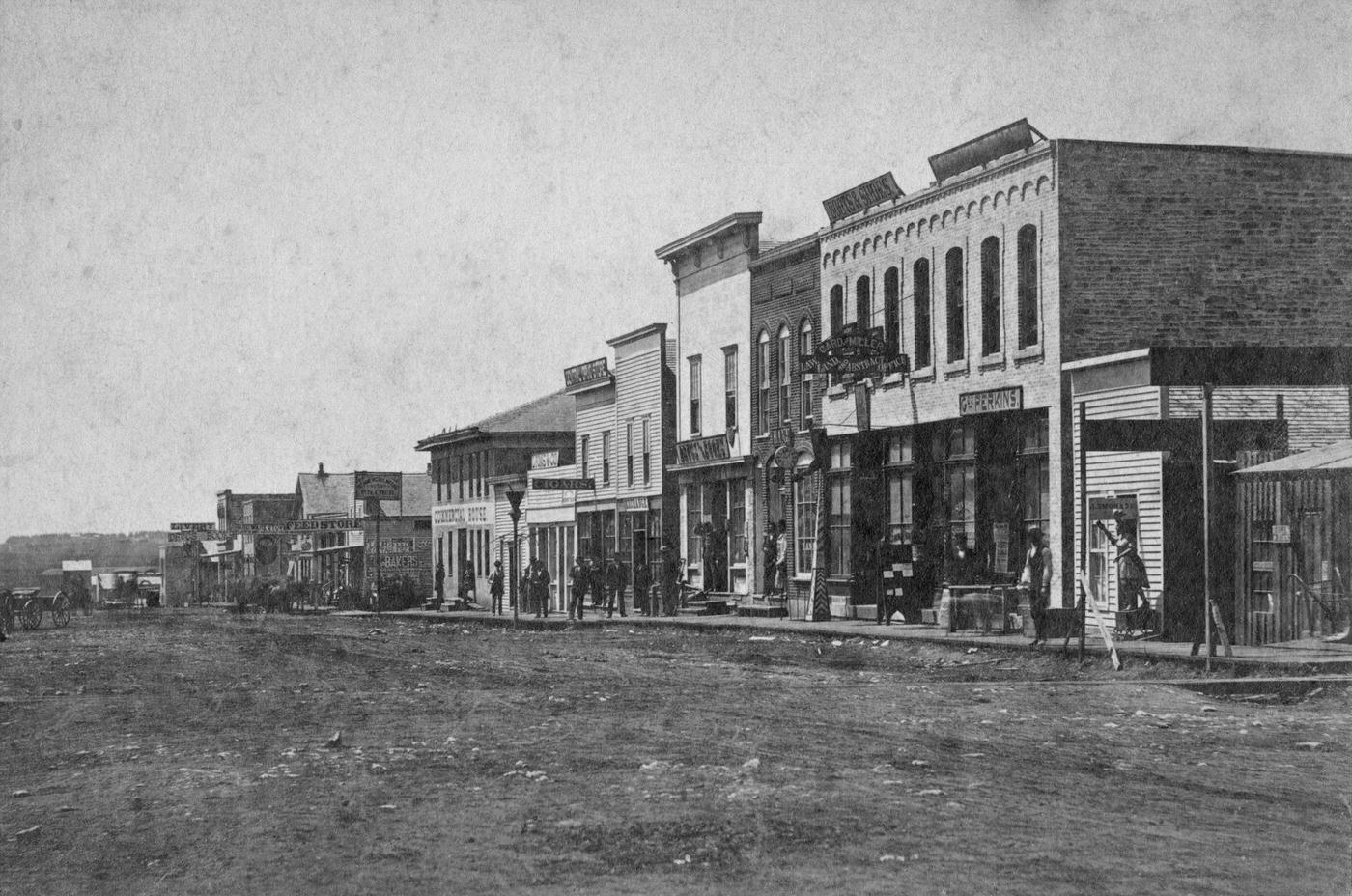 #73 Unidentified Western Frontier Town, view of buildings, in a small frontier town on the Plains, during America’s westward expansion era, nineteenth century.