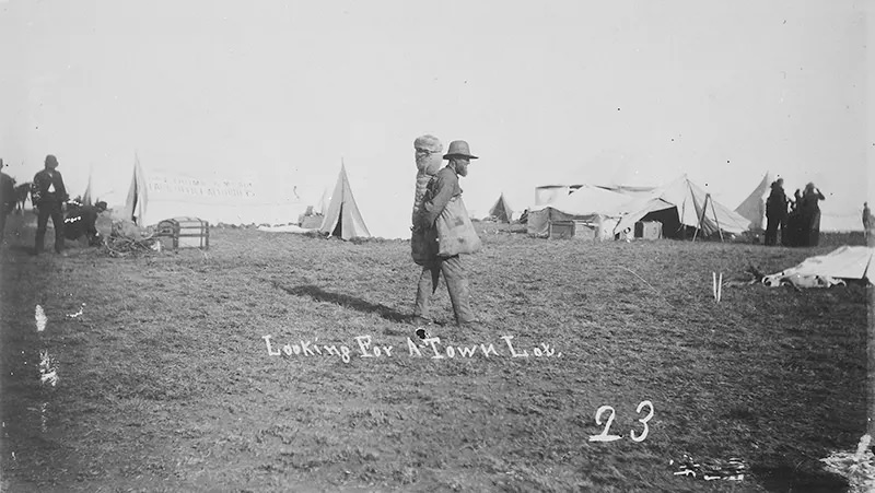 #82 A new settler searches for a lot in the site of a new town in Guthrie, Oklahoma in 1889.