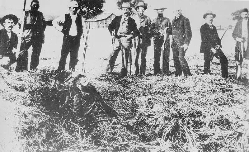 #98 Outlaw John Sontag was shot to death on September 14, 1904. This photograph was taken while he was not yet dead.