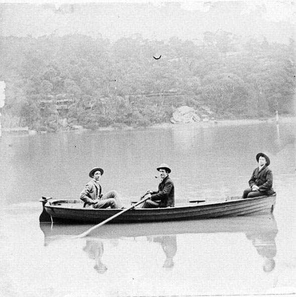 #11 Three people in a rowing boat, possibly Sydney Harbour