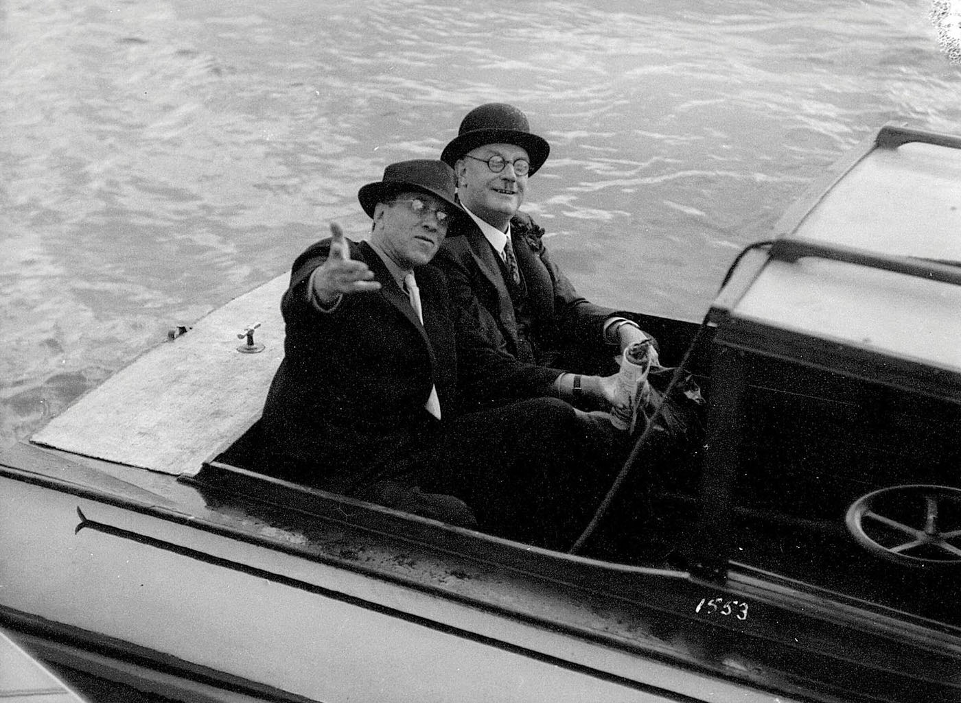 #21 Two men seated in a motor launch, MISS PHYLISS, on Sydney Harbour