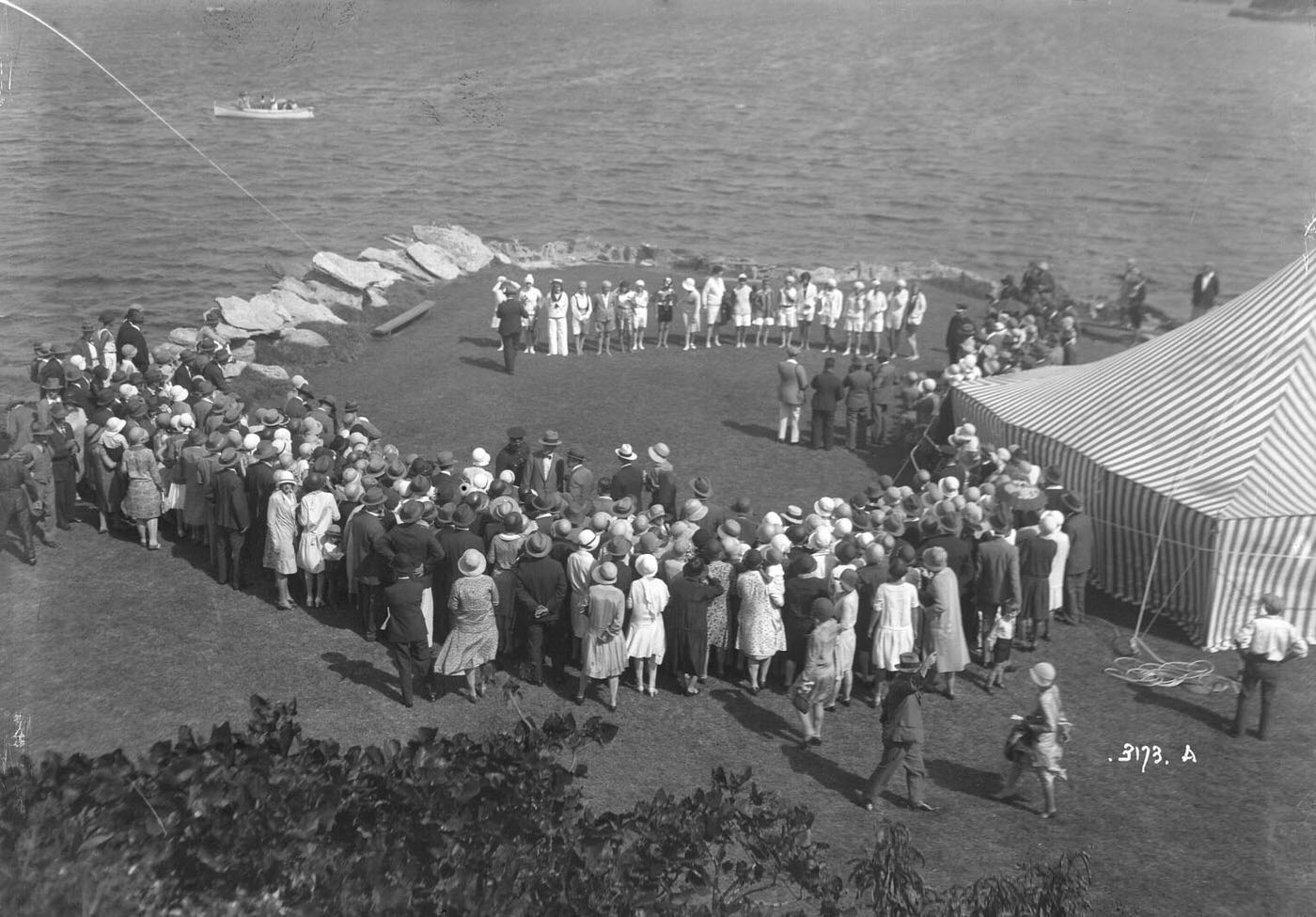 #37 Spectators watching a presentation of Queen of the Harbour, Clark Island