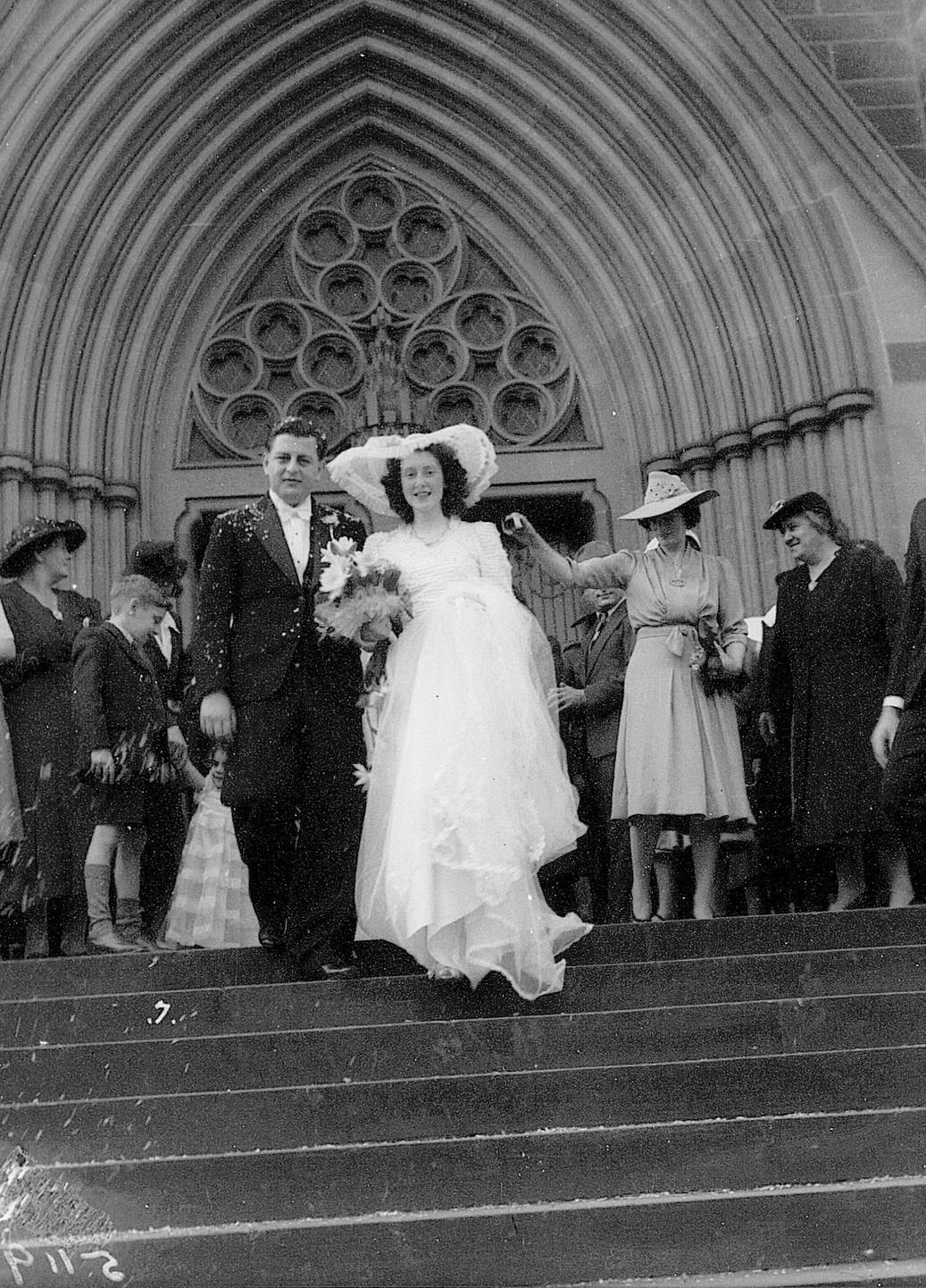 #8 Bride and groom walking down St Marys Cathedral steps, Sydney