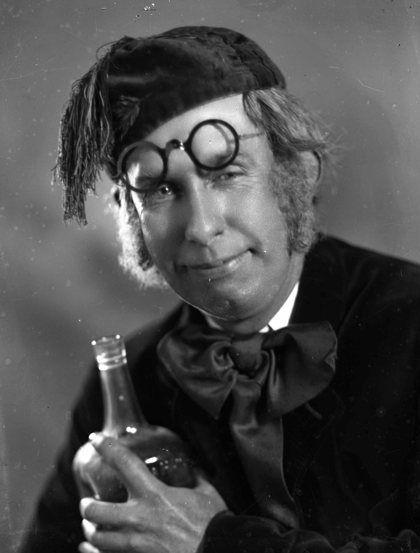#30 Portrait of a man holding a bottle
