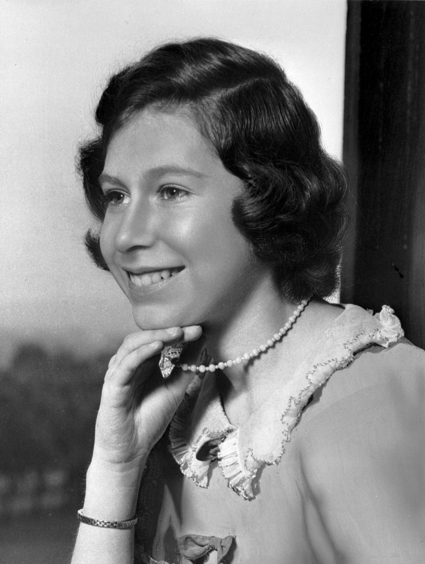 #45 Princess Elizabeth smiling at Windsor Castle, Berkshire, Great Britain, 22nd June 1940.
