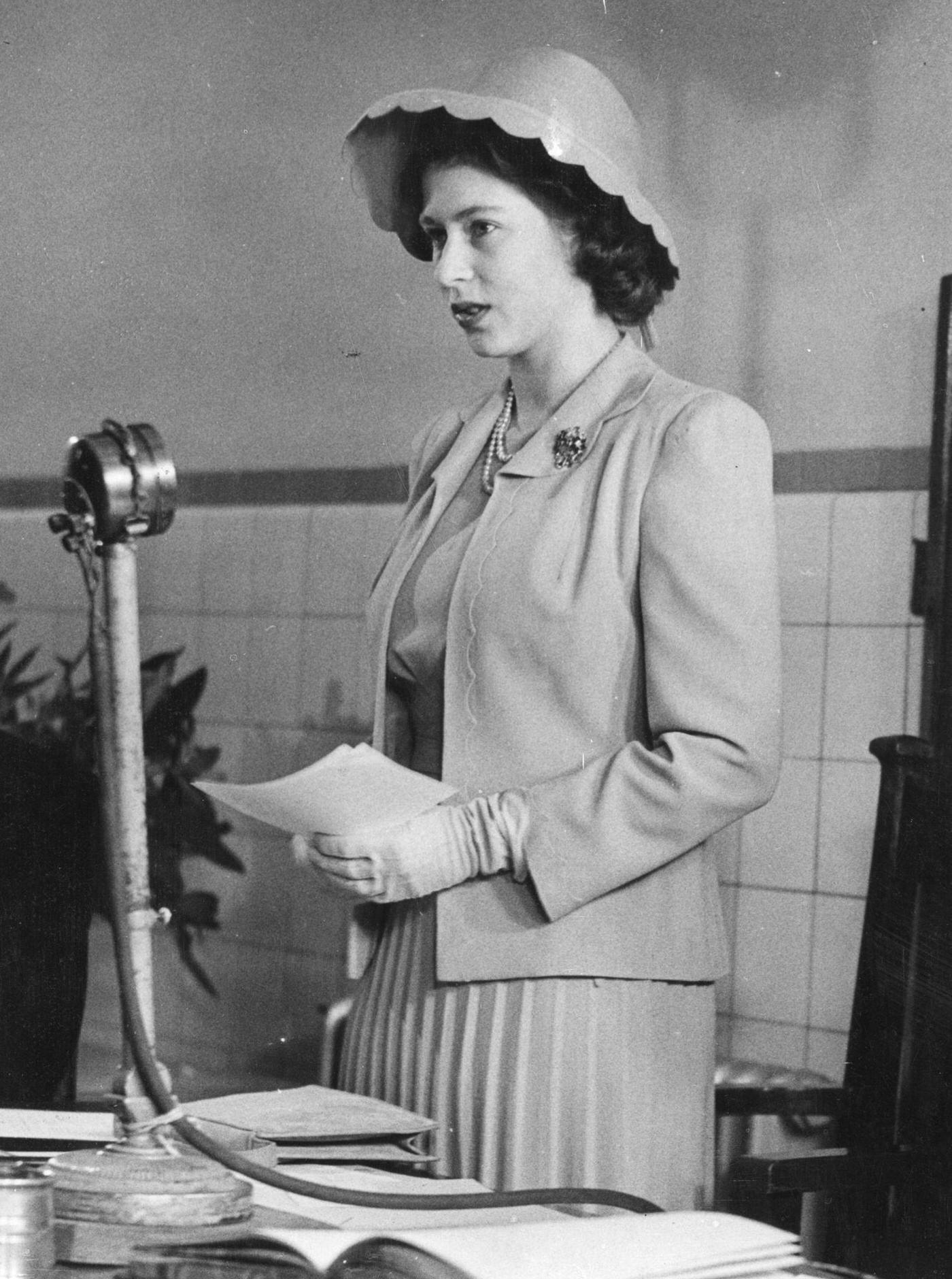 #68 Princess Elizabeth addressing the Governors Court at the Queen Elizabeth Hospital for Children as their President, her first solo engagement, 1944