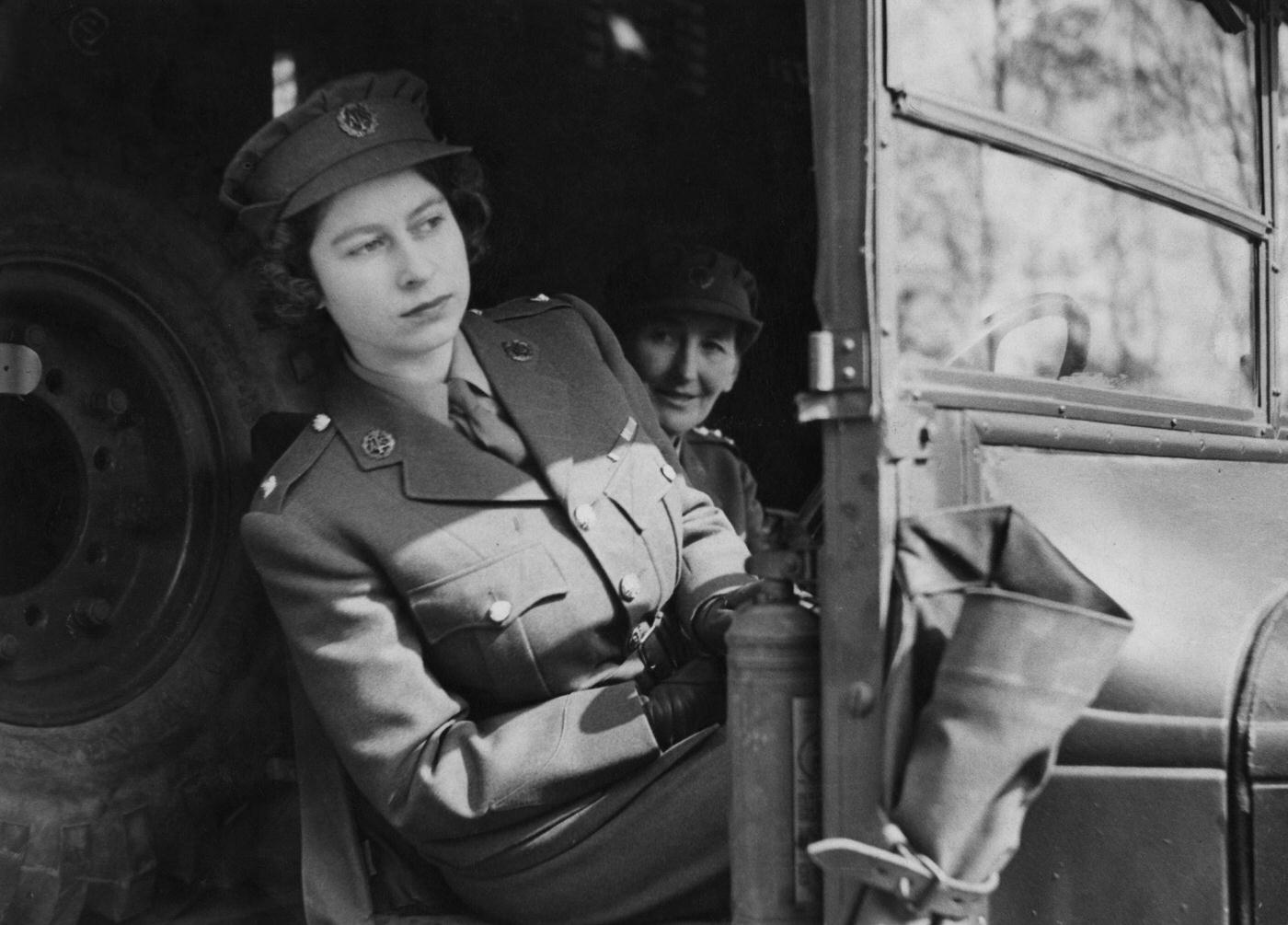 #77 Princess Elizabeth driving an ambulance during her wartime service in the A.T.S. (Auxiliary Territorial Service), 1945