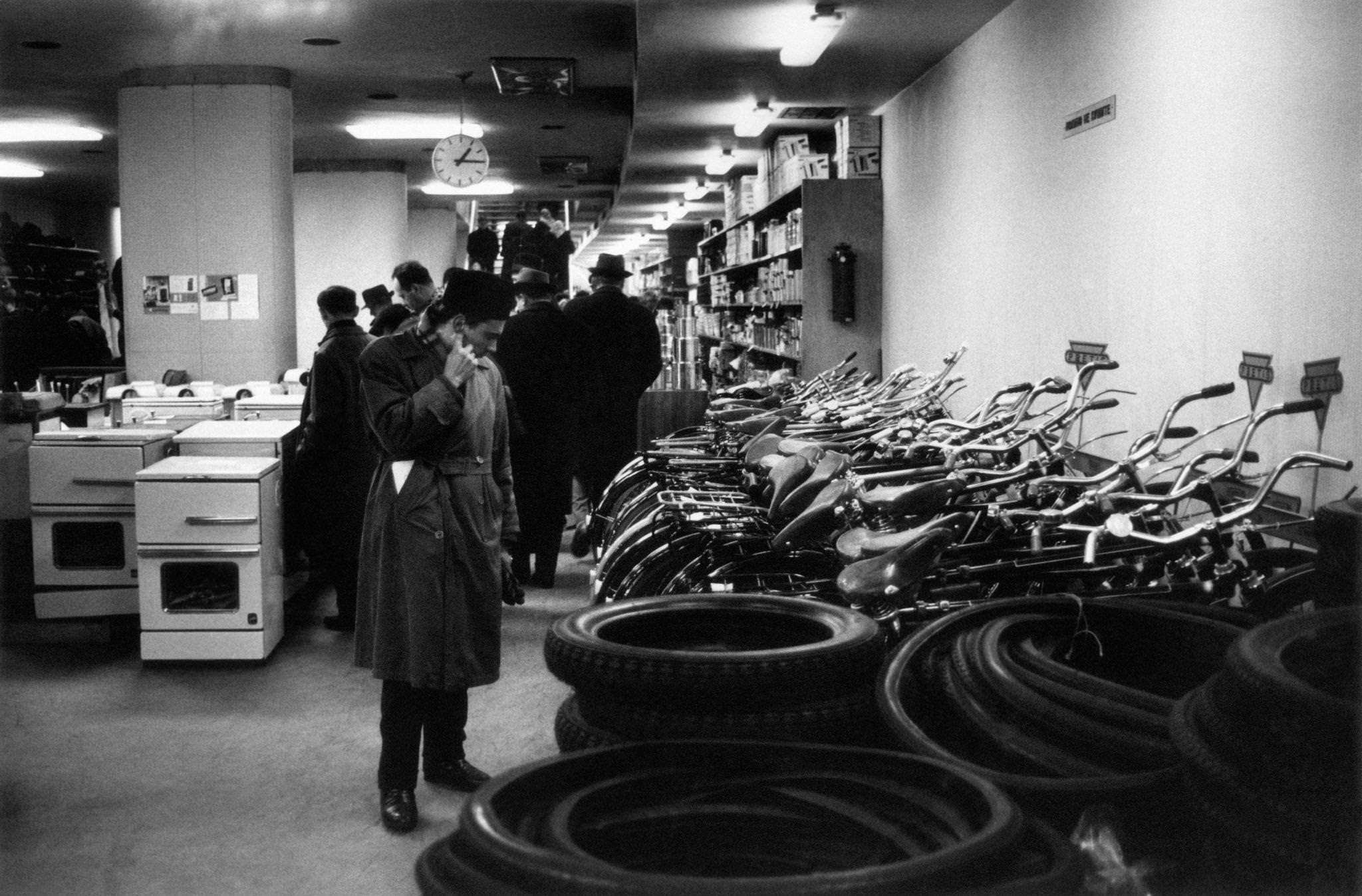 #29 People watching goods displayed at the department store in Belgrade, 1965