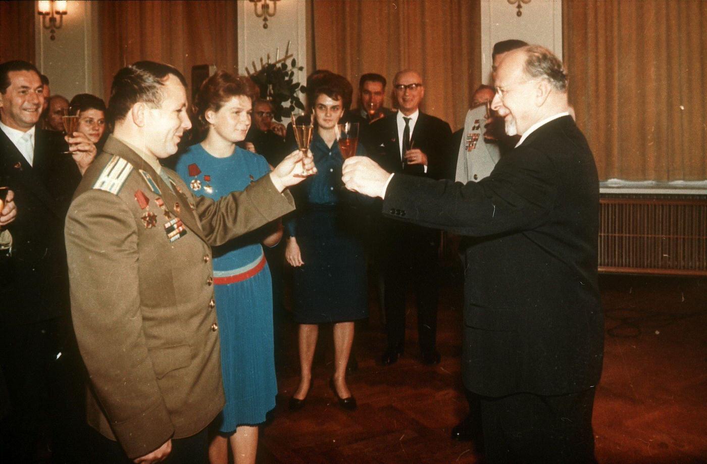 #17 Walter Ulbricht, First Secretary of the Central Committee of the Socialist Unity Party of Germany, clinks glasses with Yuri Gagarin and Valentina Tereshkova (cosmonauts) during a reception, 1963.