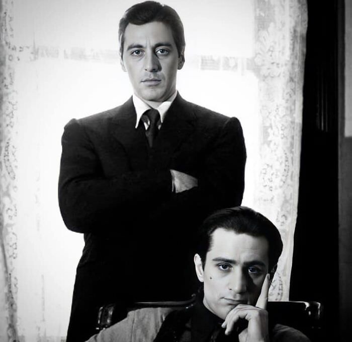 #23 Al Pacino and Robert De Niro posing in a production still for The Godfather: Part II, 1974