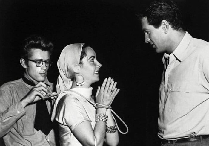 #70 James Dean, Elizabeth Taylor, and Rock Hudson on the set of Giant in 1955