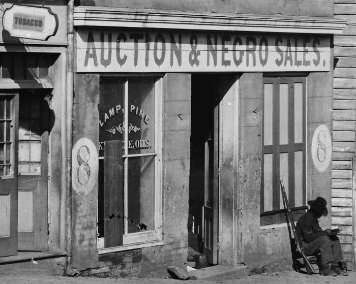 #81 George N. Barnard’s 1864 photograph of a slave trader’s business on Whitehall Street, Atlanta, Georgia