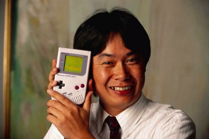 #85 Shigeru Miyamoto, Creator of Mario and Nintendo Games, with Game Boy (1992)