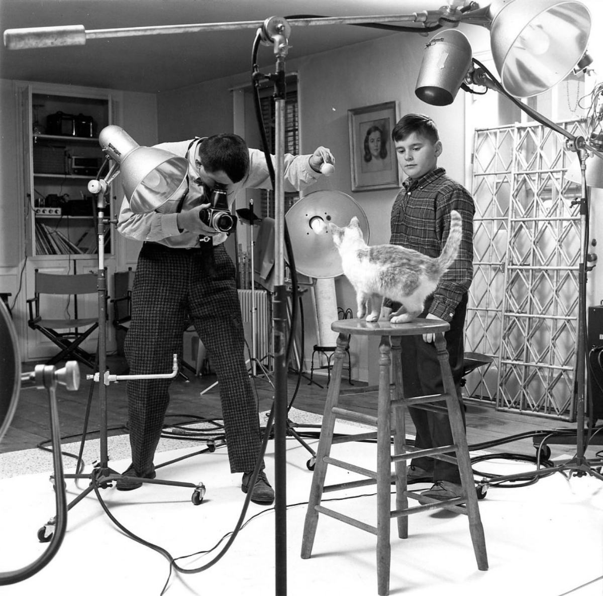 #19 Mr. Chandoha with his son Enrico and a subject in his home studio in 1961.