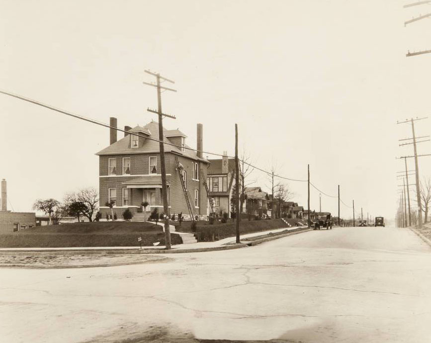 #42 Men working on the tuckpointing of a house on the corner of Fyler Avenue and Watson Road in the Lindenwood Park neighborhood, 1930