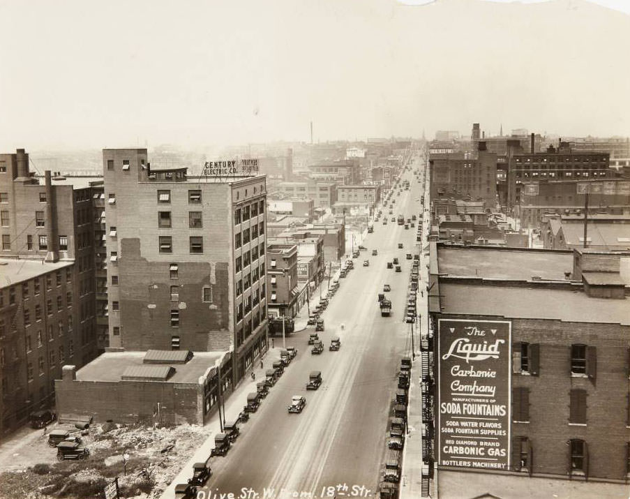 #50 View of Olive St. looking west from 18th St. with the Century Electric Co. works building visible on the south side, 1930
