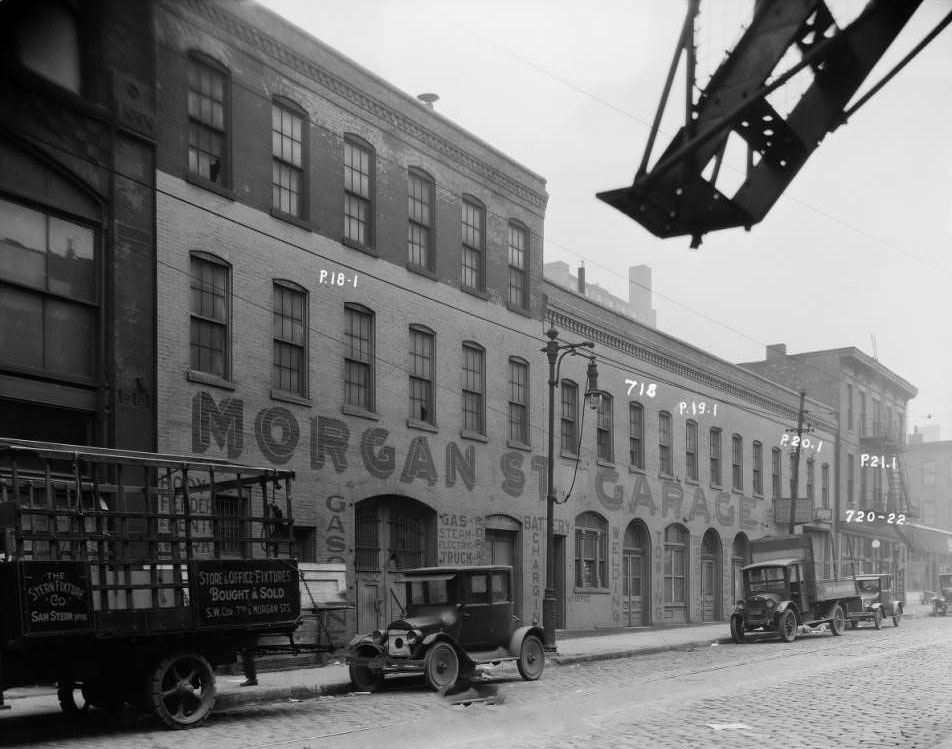 #69 Morgan Street Garage, 1930 – 718, 720 – 722 Morgan Street. Large building painted: Morgan Street Garage.