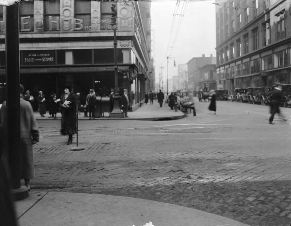 #100 View of The Hub, Complete Home Furnishers storefront at 701 Washington Ave, 1930