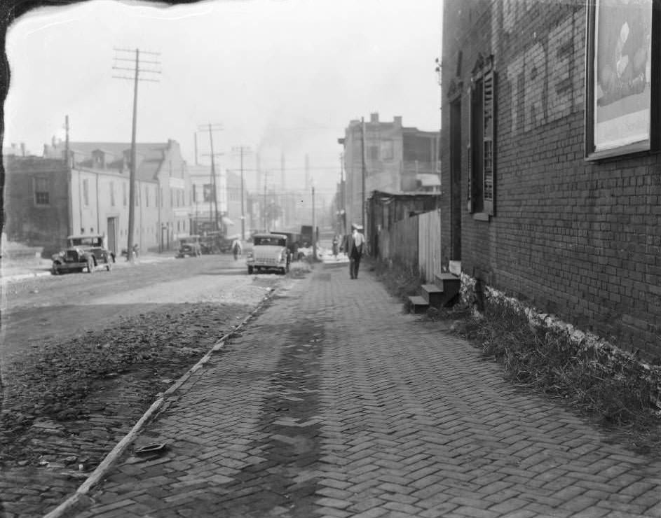 #133 View down southside of Carroll St. at intersection with Seventh St. with South Broadway visible, 1930