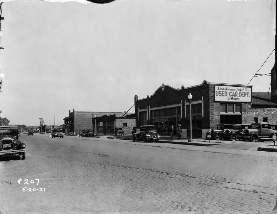 #141 View of Love-Johnson Motor Co. Used Car Dept. building at 5236 Natural Bridge with Warner-Walsh Chevrolet Company building in the distance, 1930