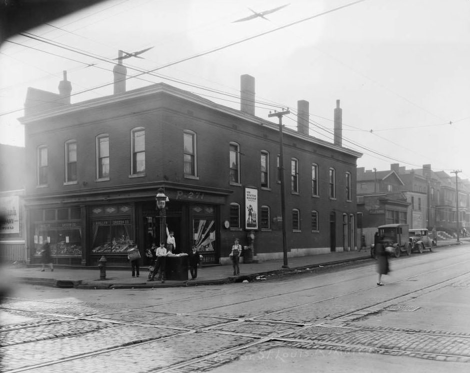 #142 Street view of J. Mueller Grocer Company at 2829 Marcus Avenue, 1930