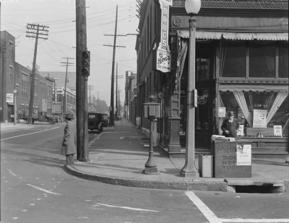 #163 View looking North from the corner of Olive and N. Compton toward Locust Street. Standard Auto Parts is visible in the distance, 1930