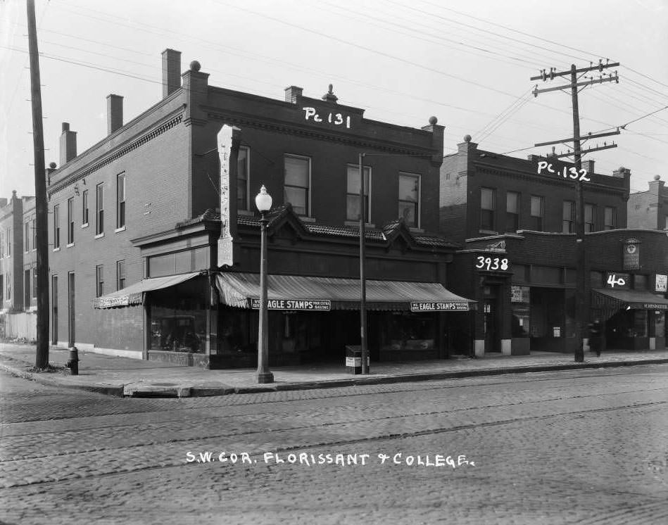 #169 Two-story storefronts at the 3900 block of West Florissant at College Avenue. Kling and Katch Men’s Furnishings at 3934-3936. Florissant Leader, Ready to Wear Clothing at the corner, 1930